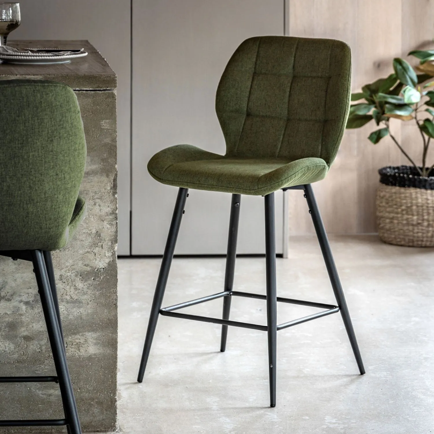 Green Fabric Bar Stool with Stitch Detailing and Black Legs