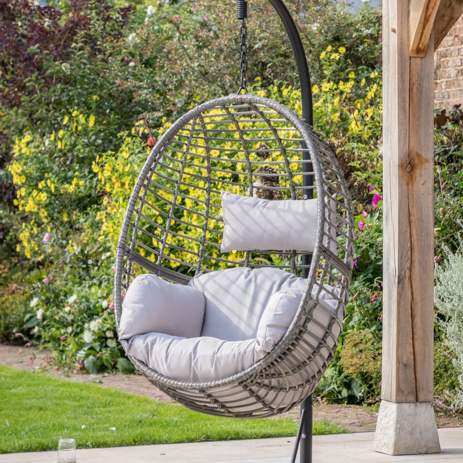 Natural Rattan Single Outdoor Hanging Chair on Stand